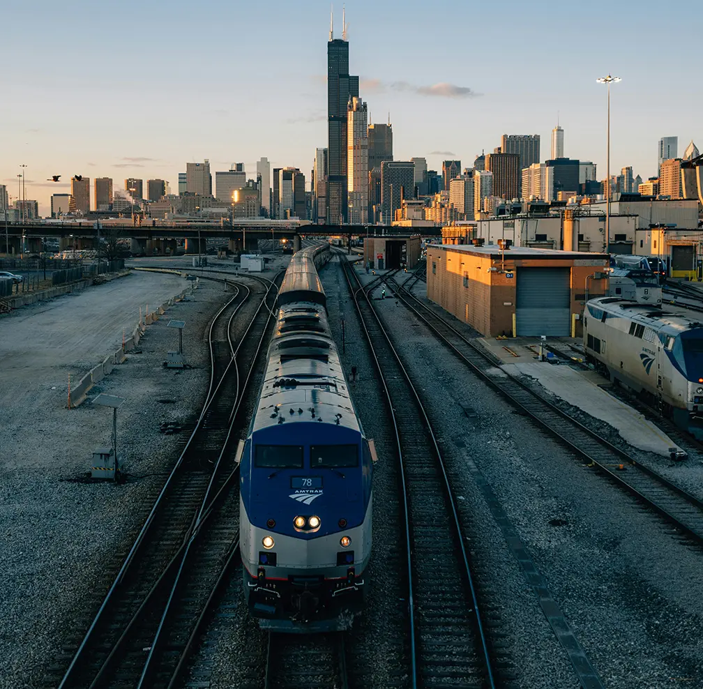 Amtrak train with Chicago skyline